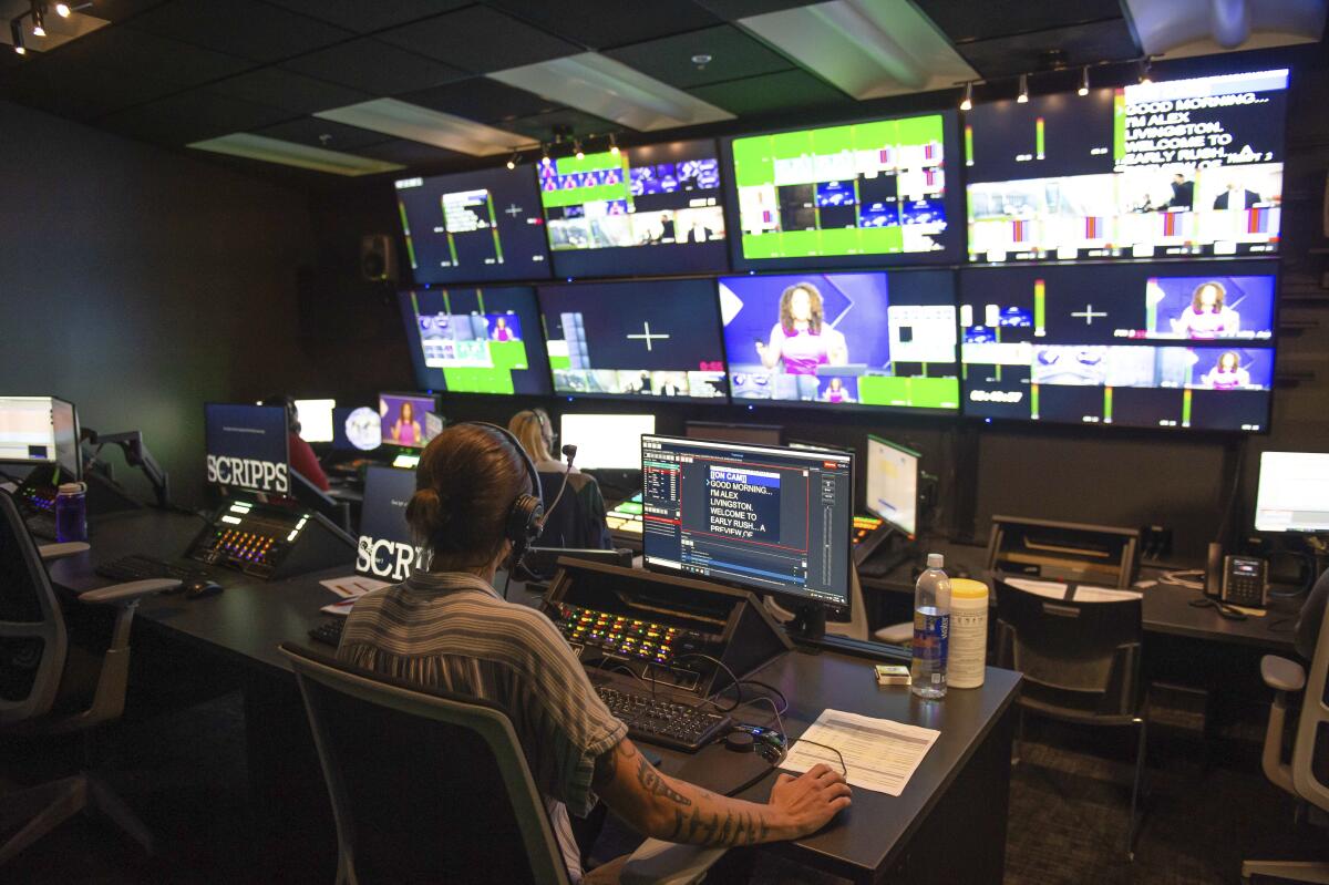This Oct. 1, 2021 image provided by Newsy/Scripps shows the Newsy control room in Atlanta. With an expansion and relaunch Monday, Oct. 4, 2021 the Scripps Networks service Newsy is betting that consumers have an interest in more news and less political talk. Newsy has been primarily seen online and through streaming services but is debuting a free, over-the-air television service with the goal of around-the-clock newscasts.(Newsy/Scripps via AP)
