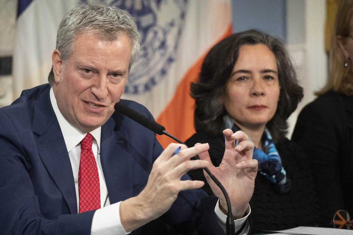 Mayor Bill de Blasio with Dr. Oxiris Barbot, former New York City public health chief.