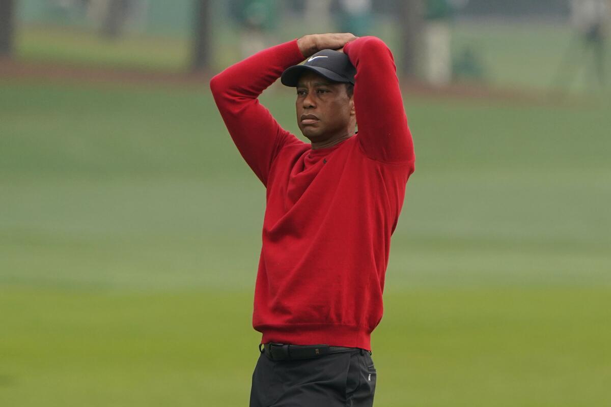 Tiger Woods reacts during the final round of the Masters golf tournament in November.