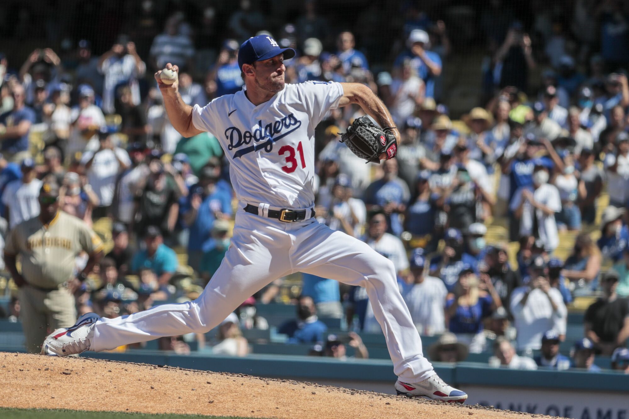 Dodgers starting pitcher Max Scherzer delivers during a win over the San Diego Padres on Sept. 12.