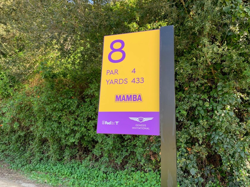 The sign by the eighth hole tee box at the Riviera Country Club for the 2020 Genesis Invitational is painted purple and gold with "Mamba" written on it in honor of Kobe Bryant.