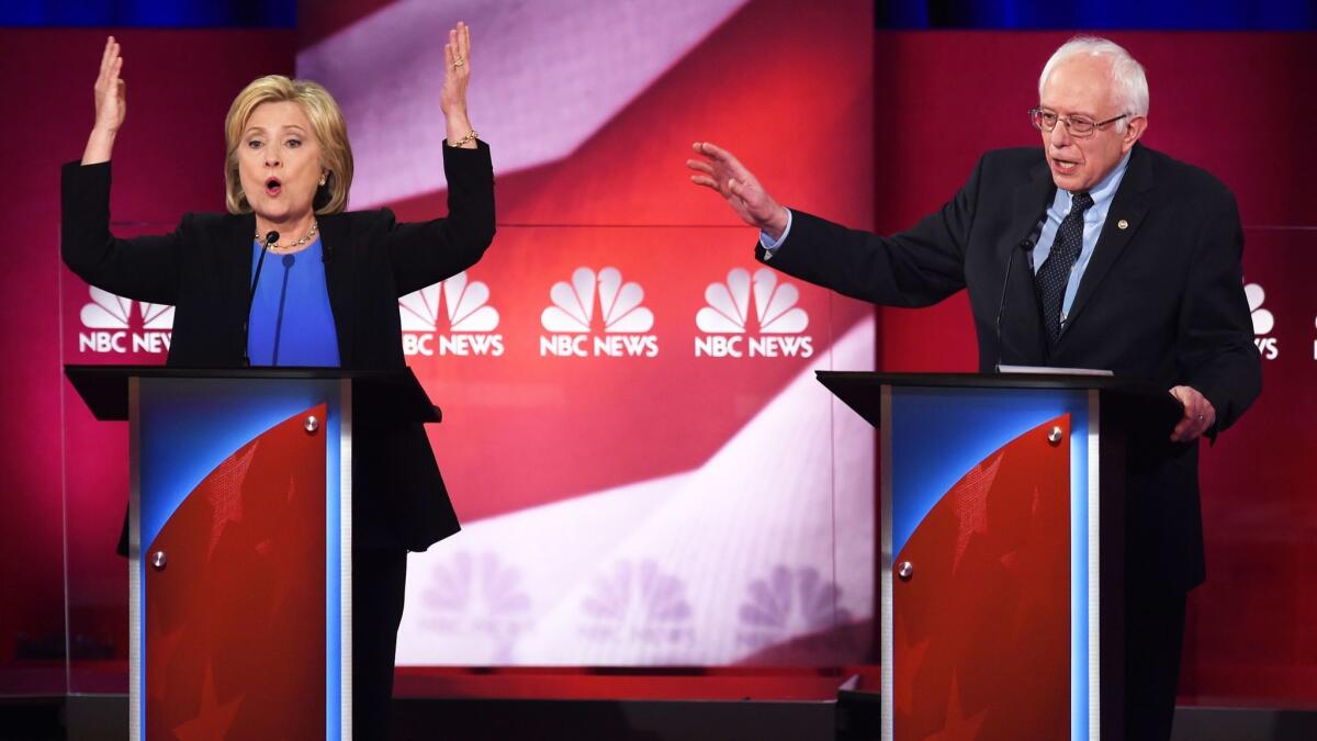 Democratic presidential candidates Hillary Clinton and Bernie Sanders participate in a debate in Charleston, S.C., on Jan. 17, 2016.