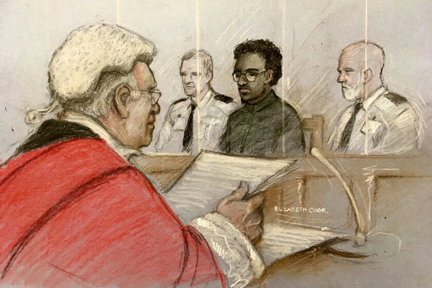 This court artist sketch by Elizabeth Cook shows Justice Nigel Sweeney, left, handing down a whole life sentence to Ali Harbi Ali, second from right, at the Old Bailey in London, Wednesday April 13, 2022. An Islamic State supporter, Ali Harbi Ali, was given a whole-life sentence Wednesday for stabbing British lawmaker David Amess to death in October 2021 in revenge for his voting in support for airstrikes on Syria. (Elizabeth Cook/PA via AP)