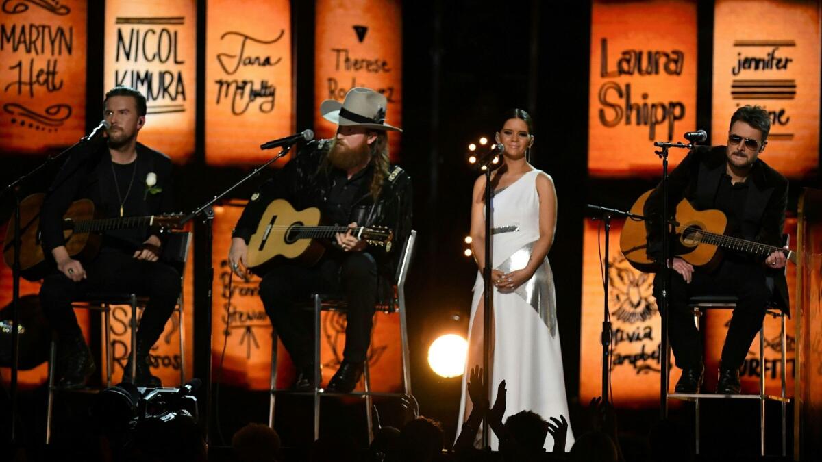 The Brothers Osborne, Maren Morris and Eric Church honored the Las Vegas and Manchester victims during their performance at the 60th Grammy Awards.