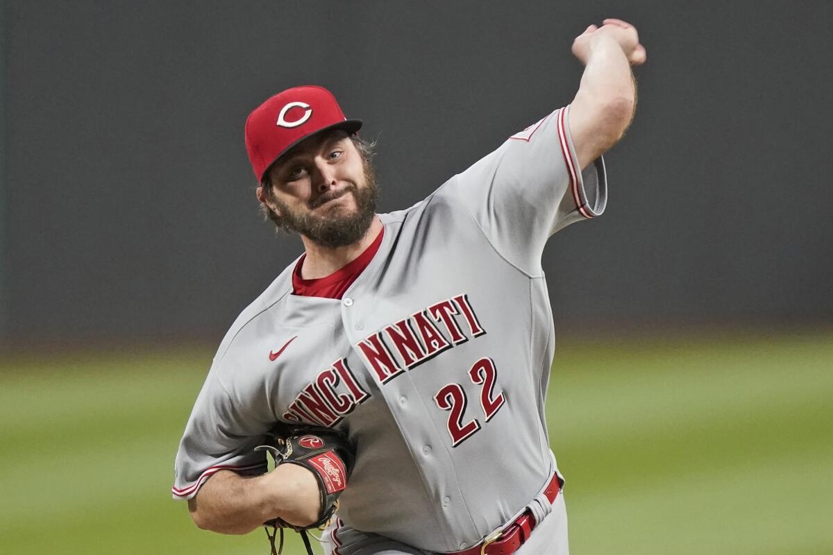 Reds starting pitcher Wade Miley delivers in the first inning against the Cleveland Indians on May 7, 2021.
