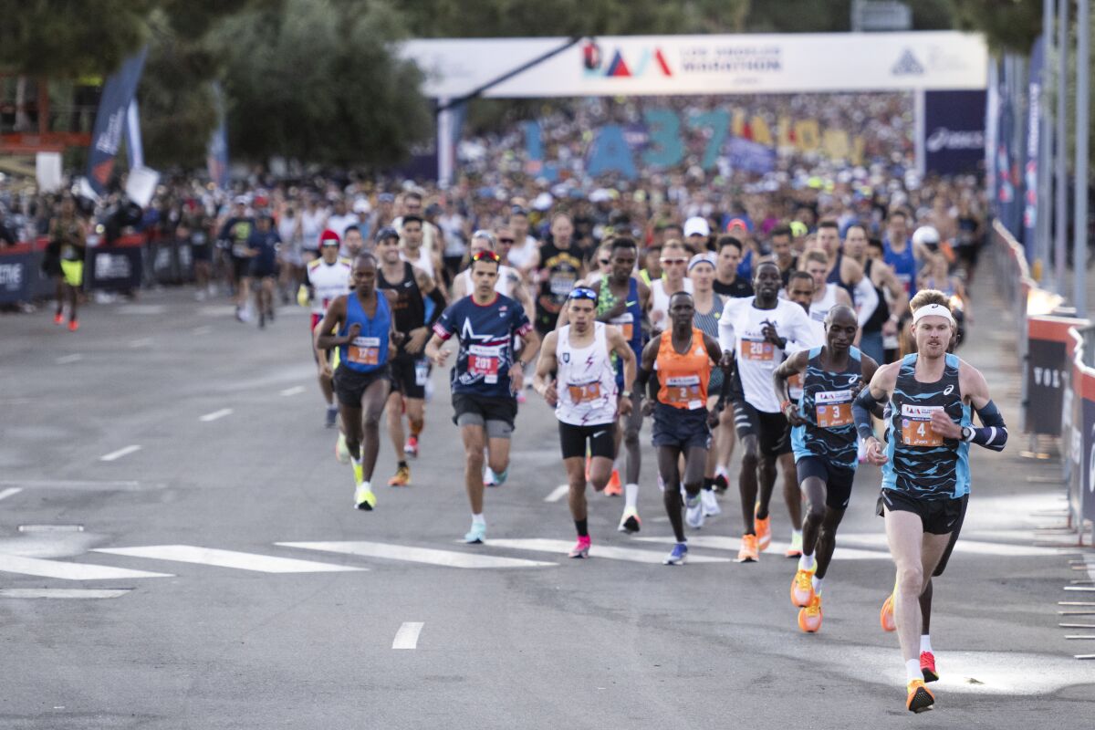 Runners take off from Dodger Stadium during the 37th annual Los Angeles Marathon. 