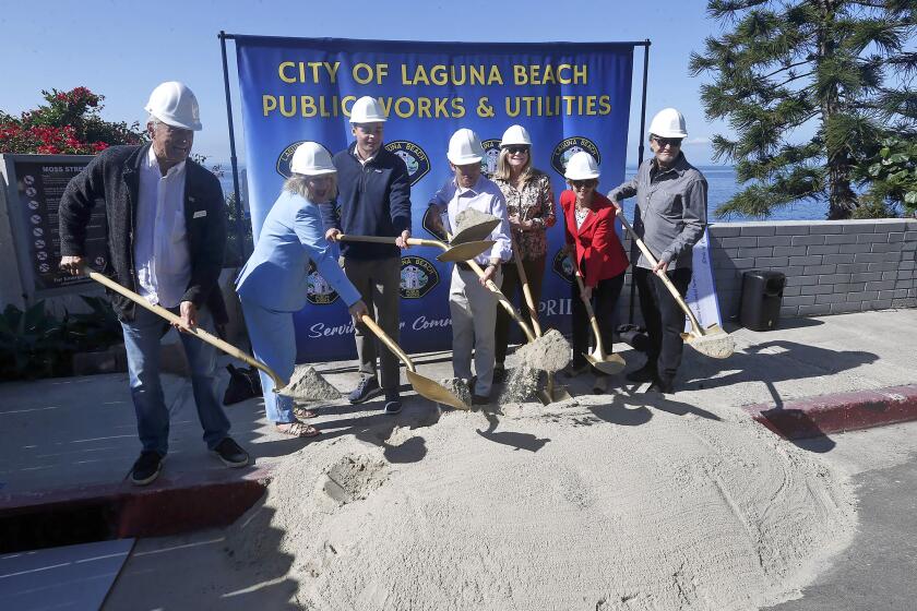 City and state officials break ground on the beach access rehabilitation project at Moss St. during ceremony on Monday. Councilmember George Weiss, supervisor Katrina Foley, councilmember Alex Rounaghi, Senator Dave Min, mayor pro-tem Sue Kemph, assembly woman Diane Dixon, and council member Mark Orgill, participate in the ground breaking ceremony, from left.