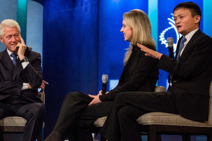 During happier times for Theranos, founder Elizabeth Holmes shared the stage with former President Clinton and Jack Ma, chairman of Alibaba Group, at an event sponsored by the Clinton Global Initiative.