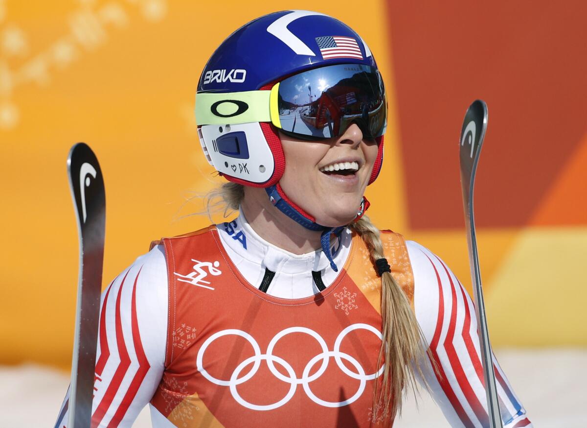United States' Lindsey Vonn smiles in the finish area of the women's combined downhill.