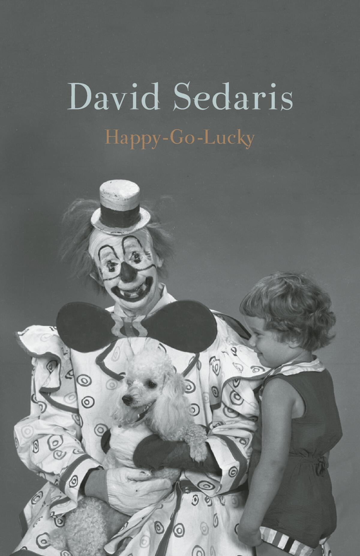 A clown holding a poodle sits next to a little girl on the cover of "Happy-Go-Lucky" by David Sedaris