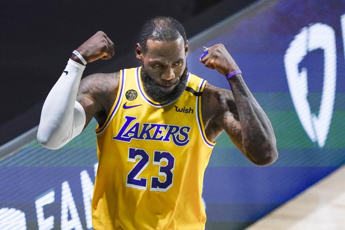 Lakers' LeBron James reacts to a play against the Portland Trail Blazers last season.