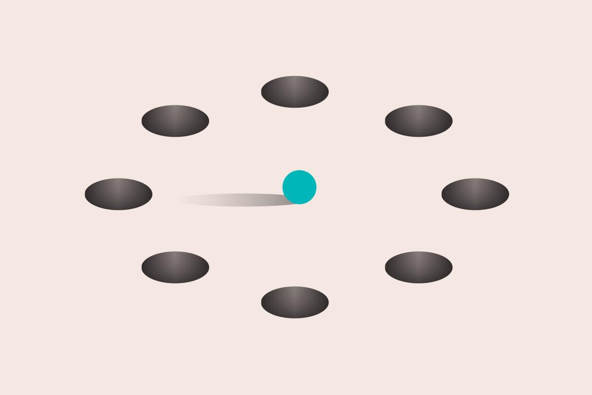 A small blue dot surrounded by six holes.