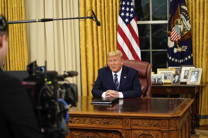 President Donald Trump speaks in an address to the nation from the Oval Office at the White House about the coronavirus Wednesday, March, 11, 2020, in Washington. (Doug Mills/The New York Times via AP, Pool)