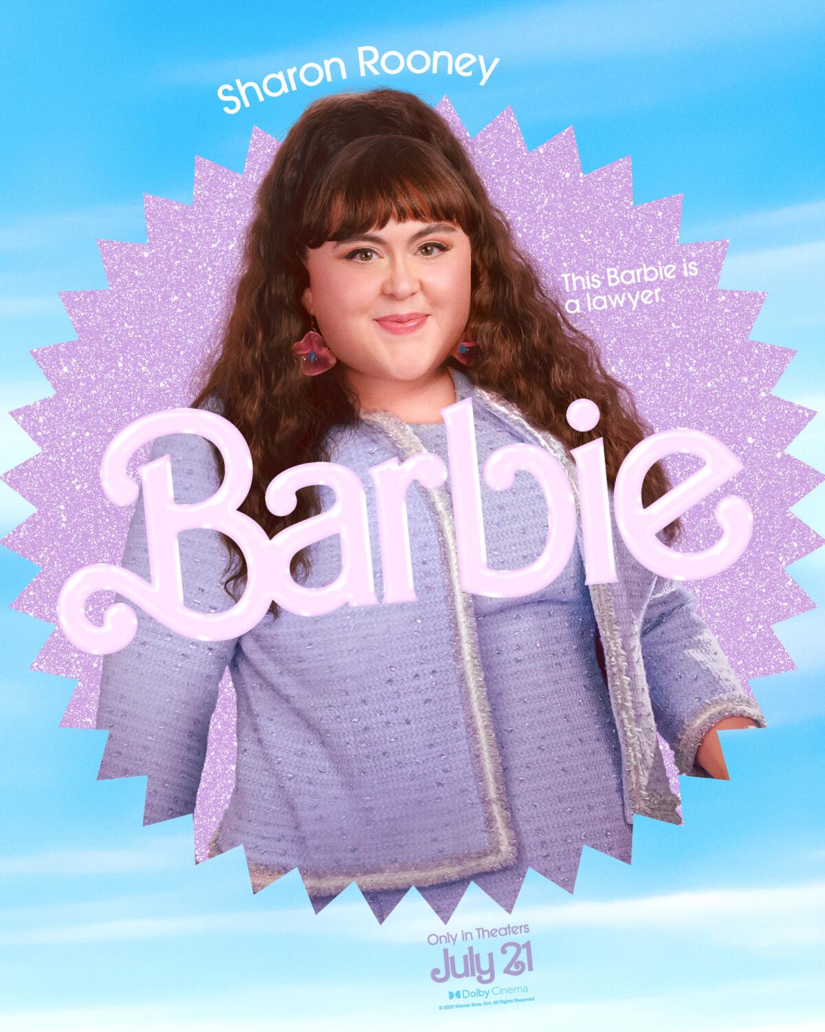 Sharon Rooney poses in a "Barbie" movie poster. She wears a lavender ensemble.