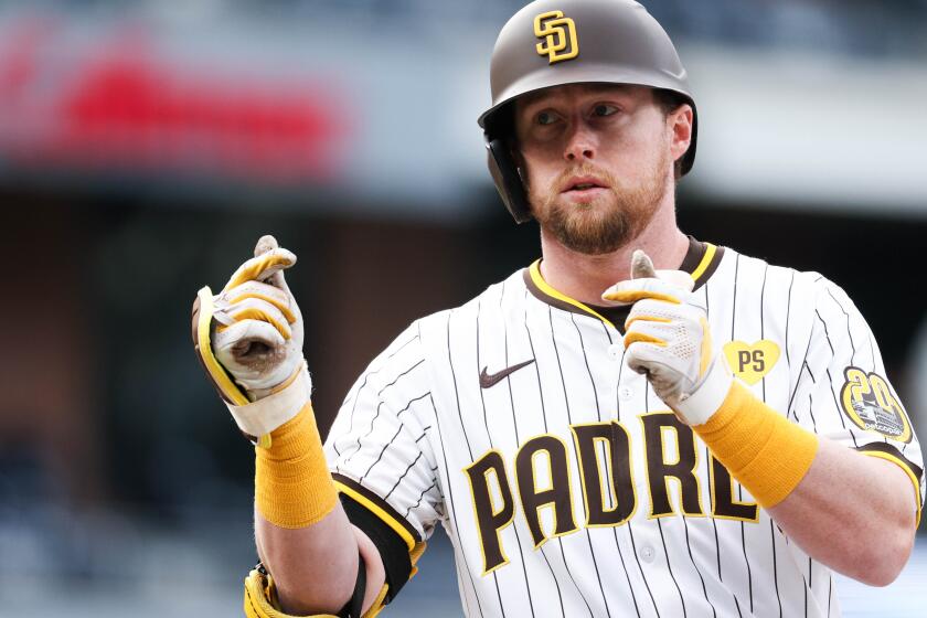 San Diego, CA - March 30: San Diego Padres first baseman Jake Cronenworth (9) celebrates a single against the San Francisco Giants during the fourth inning at Petco Park on Saturday, March 30, 2024 in San Diego, CA. (Meg McLaughlin / The San Diego Union-Tribune)