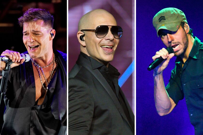 From left, Ricky Martin performs at the Hollywood Bowl in 2022; Pitbull performs at Staples Center in 2017; and Enrique Iglesias performs at Staples Center in 2017.
