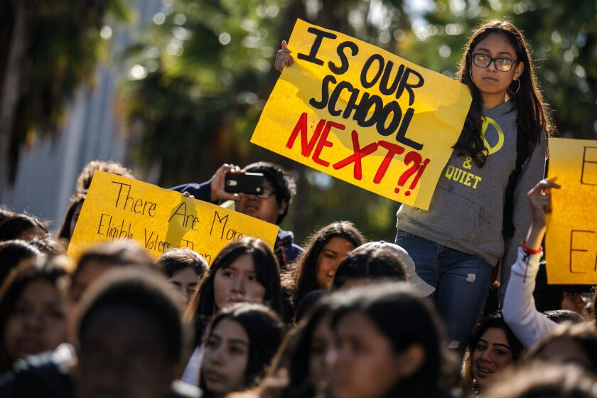 Students rally inside the school compound for the National School Walkout for Gun Control