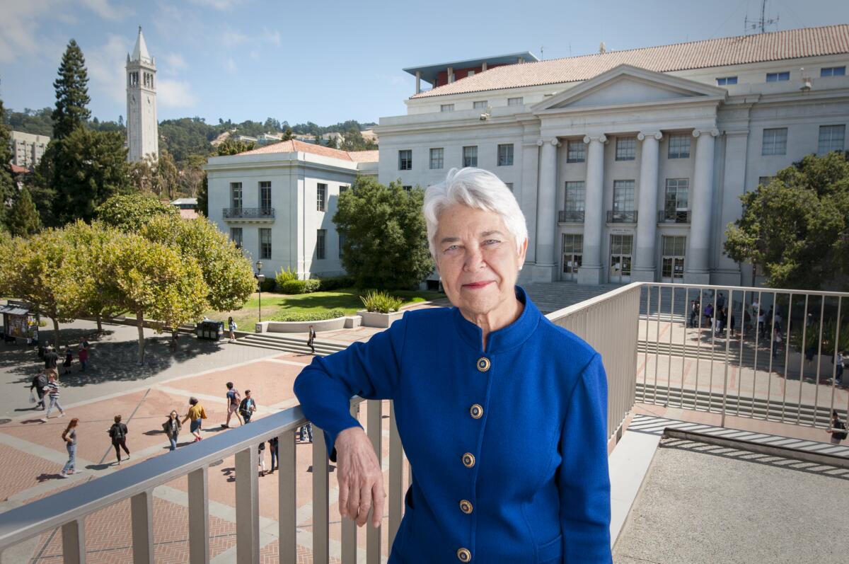 UC Berkeley Chancellor Carol Chirst poses for a portrait on a balcony in front of Sproul Plaza