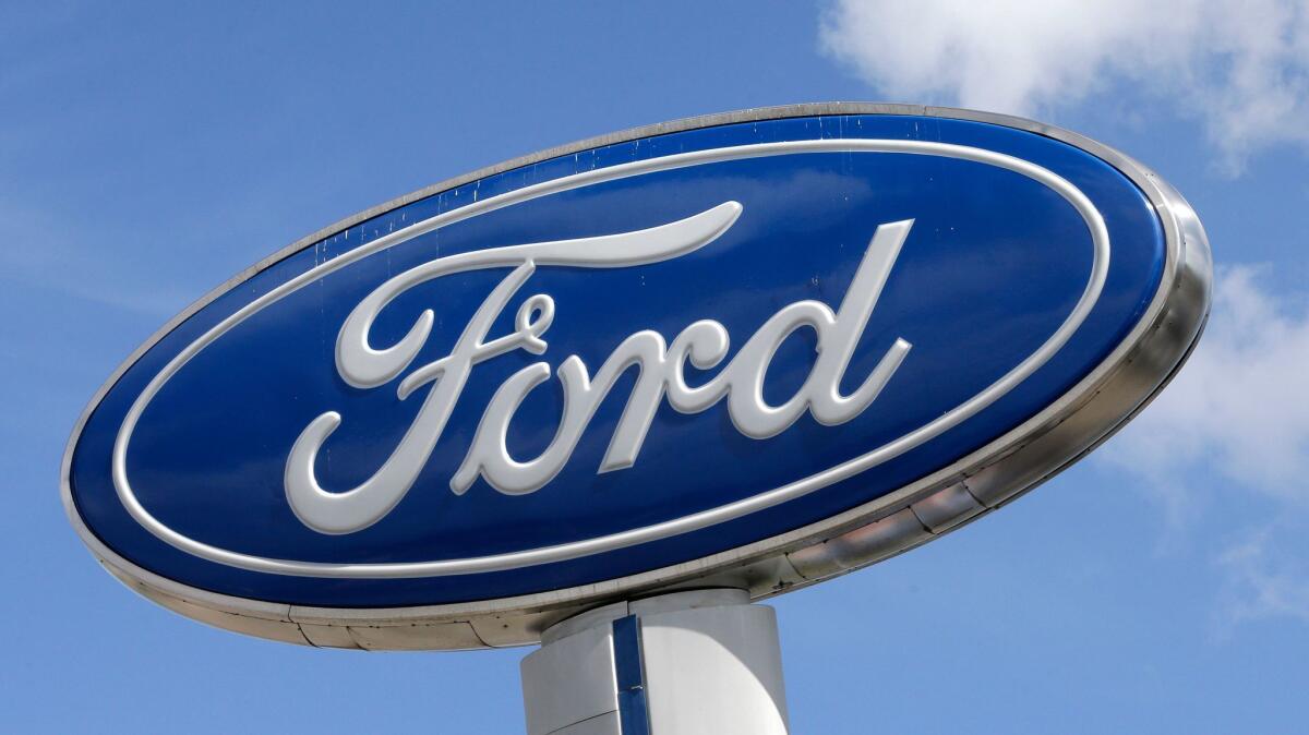 A Ford sign at an auto dealership, in Hialeah, Fla., this month.