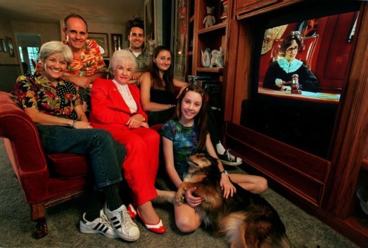 A then 13-year-old TV star Amanda Bynes with her family in 1999.