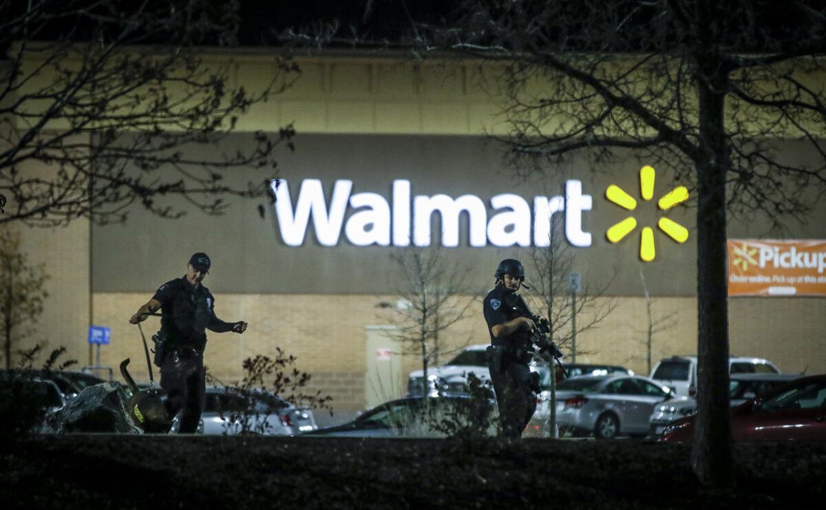 Police investigate the scene of a shooting at a Wal-Mart store in Thornton, Colorado on Nov. 1, 2017.