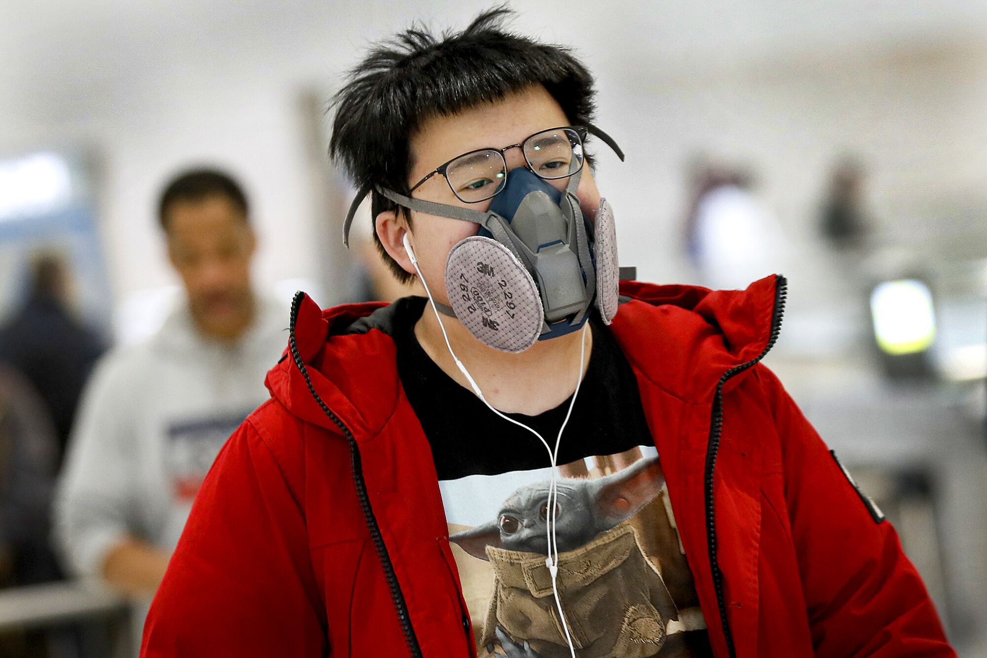 UNITED STATES: A commuter dons a face mask as he navigates New York City's transit system.