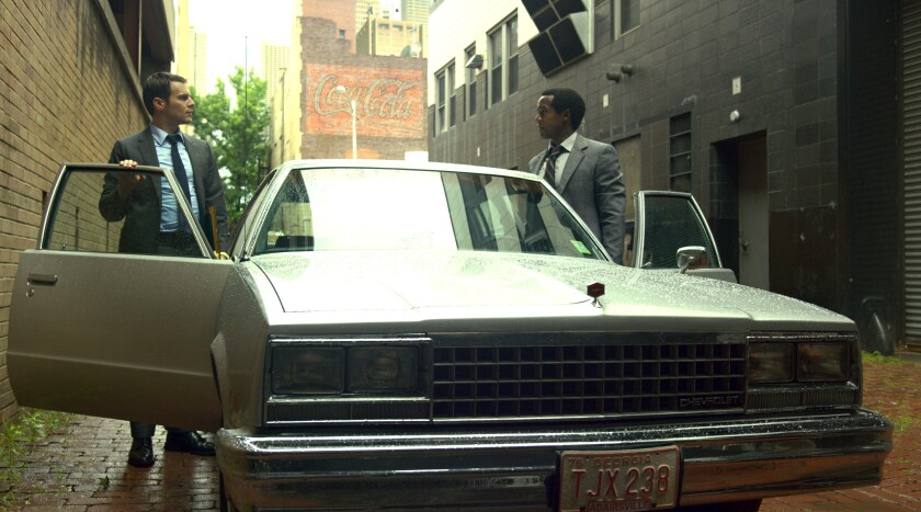 Jonathan Groff and Albert Jones get into a car in “Mindhunter” Season 2.