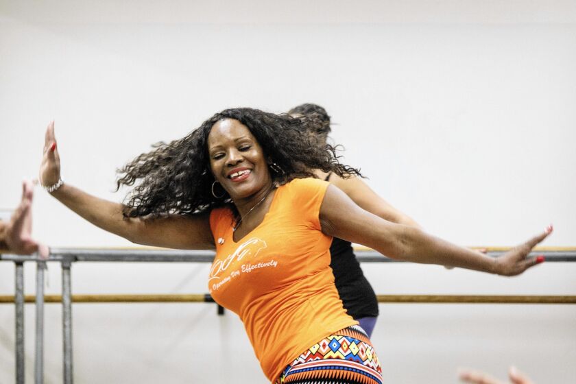Dianne Shorte swings into action in a dance fitness class at Debbie Allen Dance Academy.