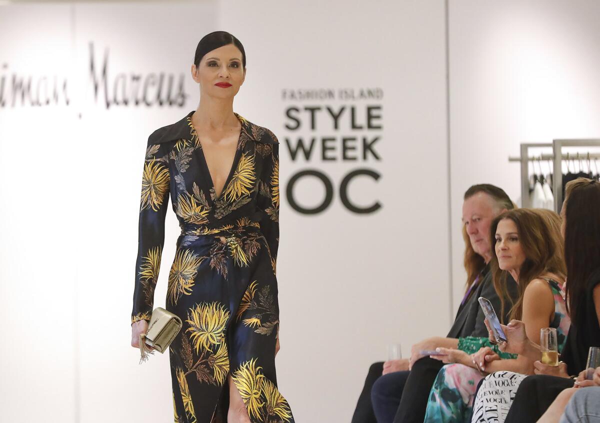 A model walks the runway during a StyleWeekOC show at the Orange County Neiman Marcus.
