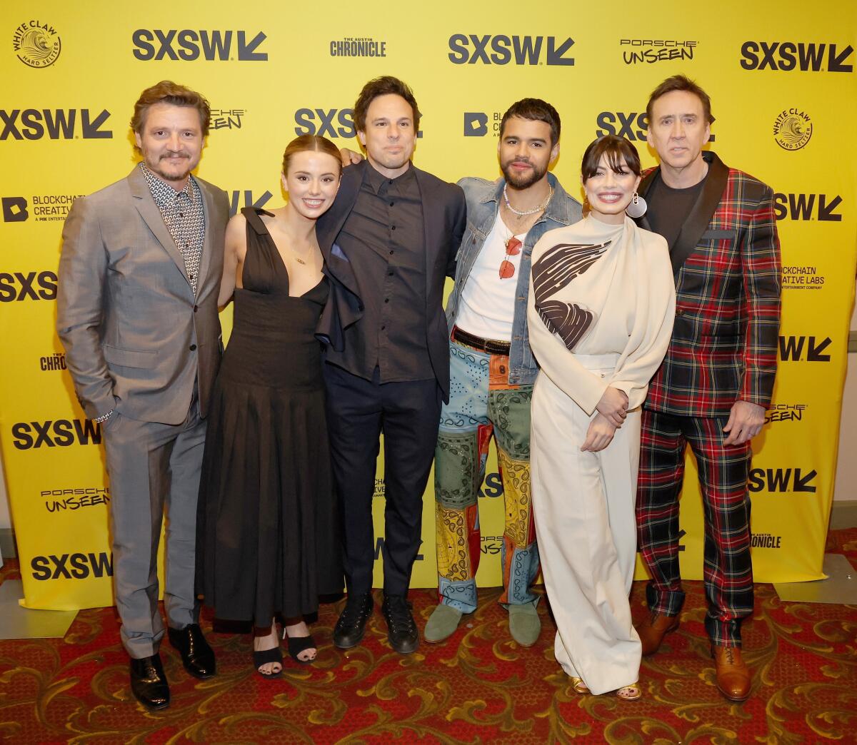 Pedro Pascal; Lily Sheen; Tom Gormican; Jacob Scipio; Alessandra Mastronardi; Nicolas Cage pose together at SXSW