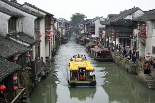 Considered the "Venice of China," Suzhou sits in the center of the Yangtze River Delta, where gondolas push through narrow waterways, lit by paper lanterns and shadowed by stone bridges.