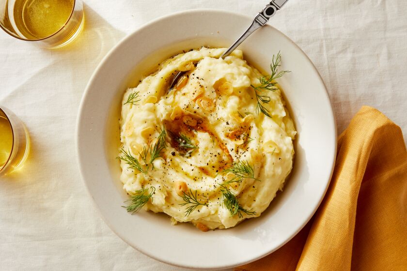Sizzled Garlic and Labneh Creamed Potatoes by Chef Andy Baraghani. Prop styling by Dorothy Hoover.