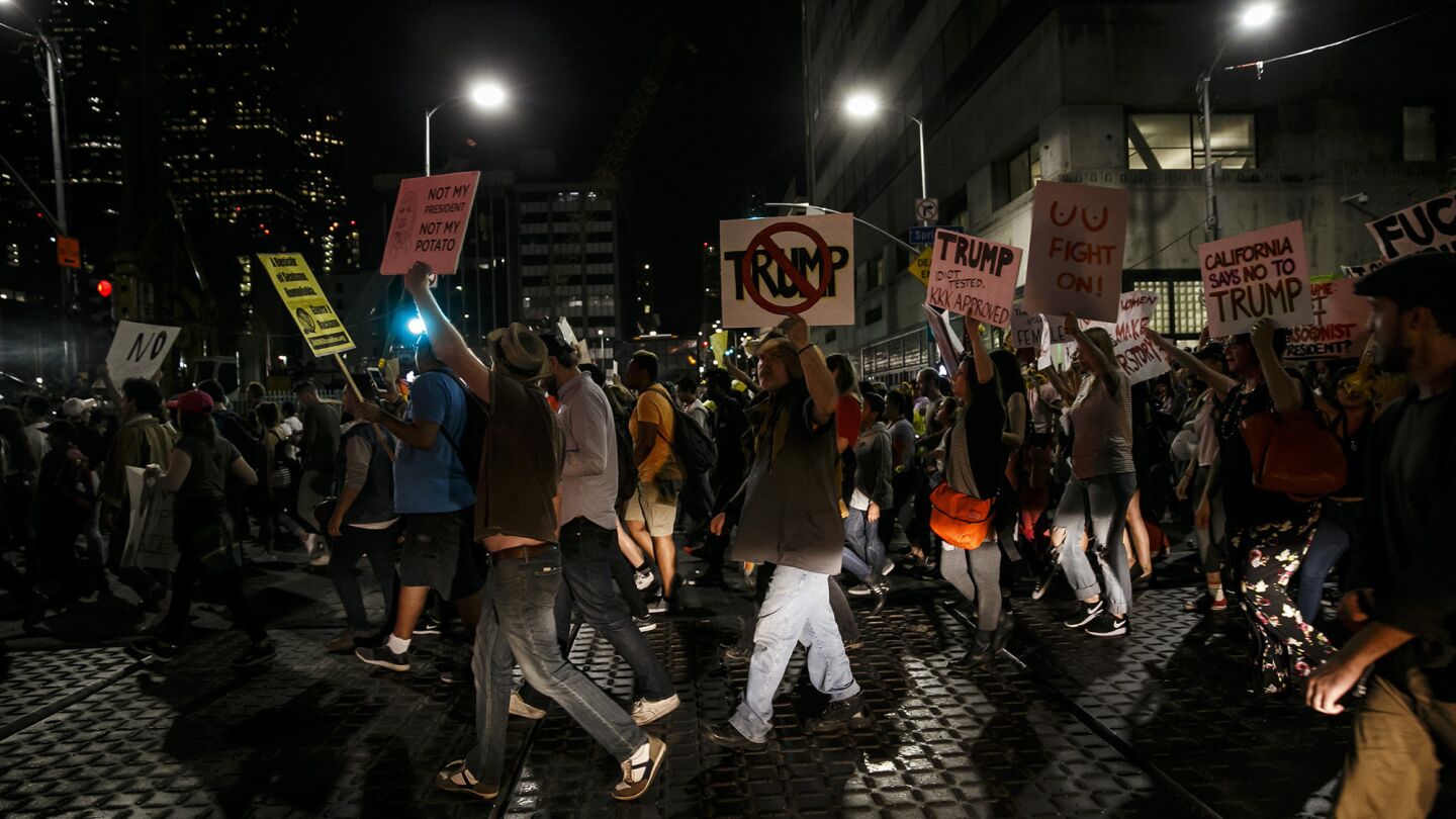 Anti-Trump protesters march down Spring Street in Los Angeles on Nov. 9.