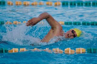 Nick Jones of San Pedro wins the 500 freestyle at the City Section swimming championships.