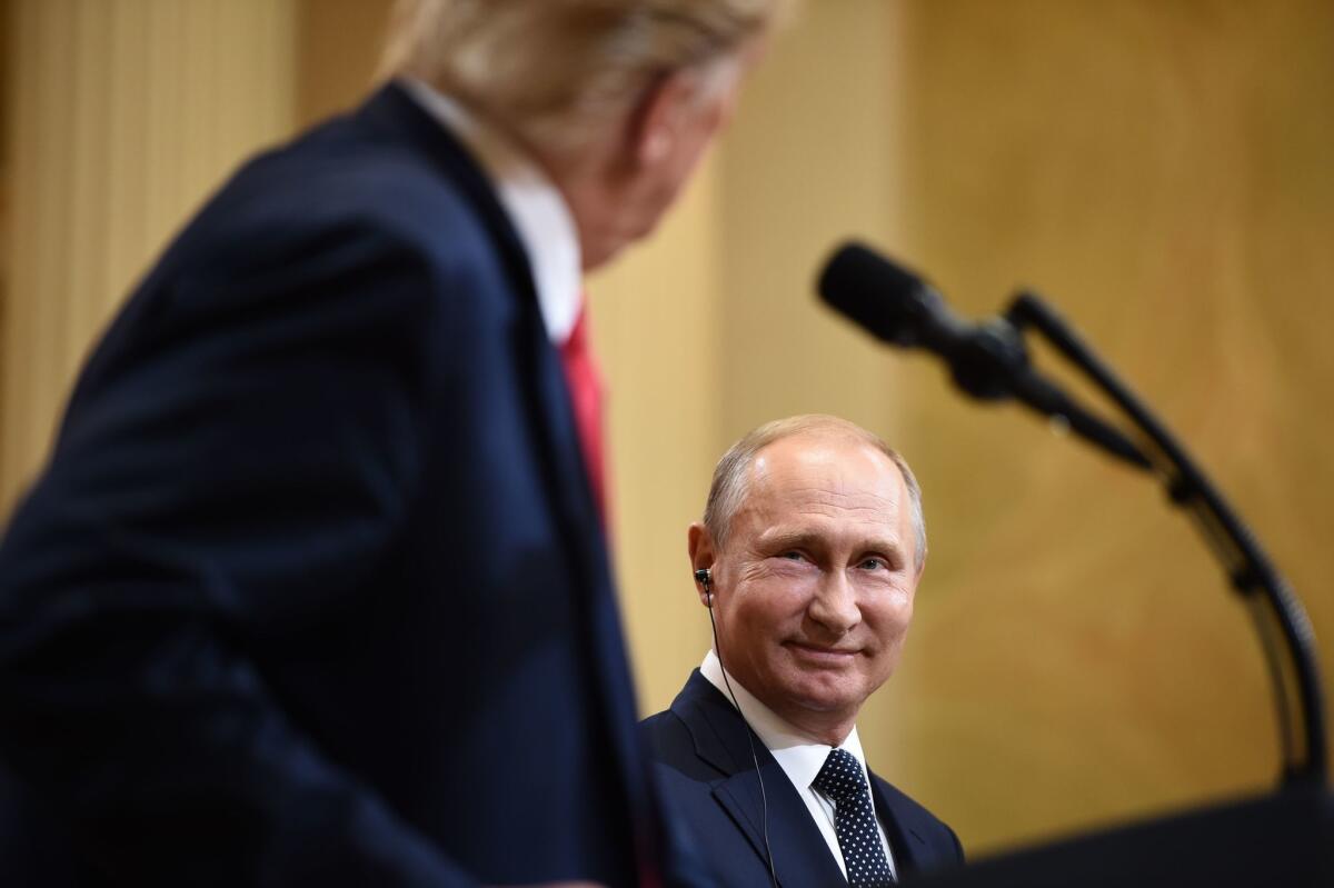 President Trump and Russia's President Vladimir Putin attend a joint press conference in Helsinki on Monday.