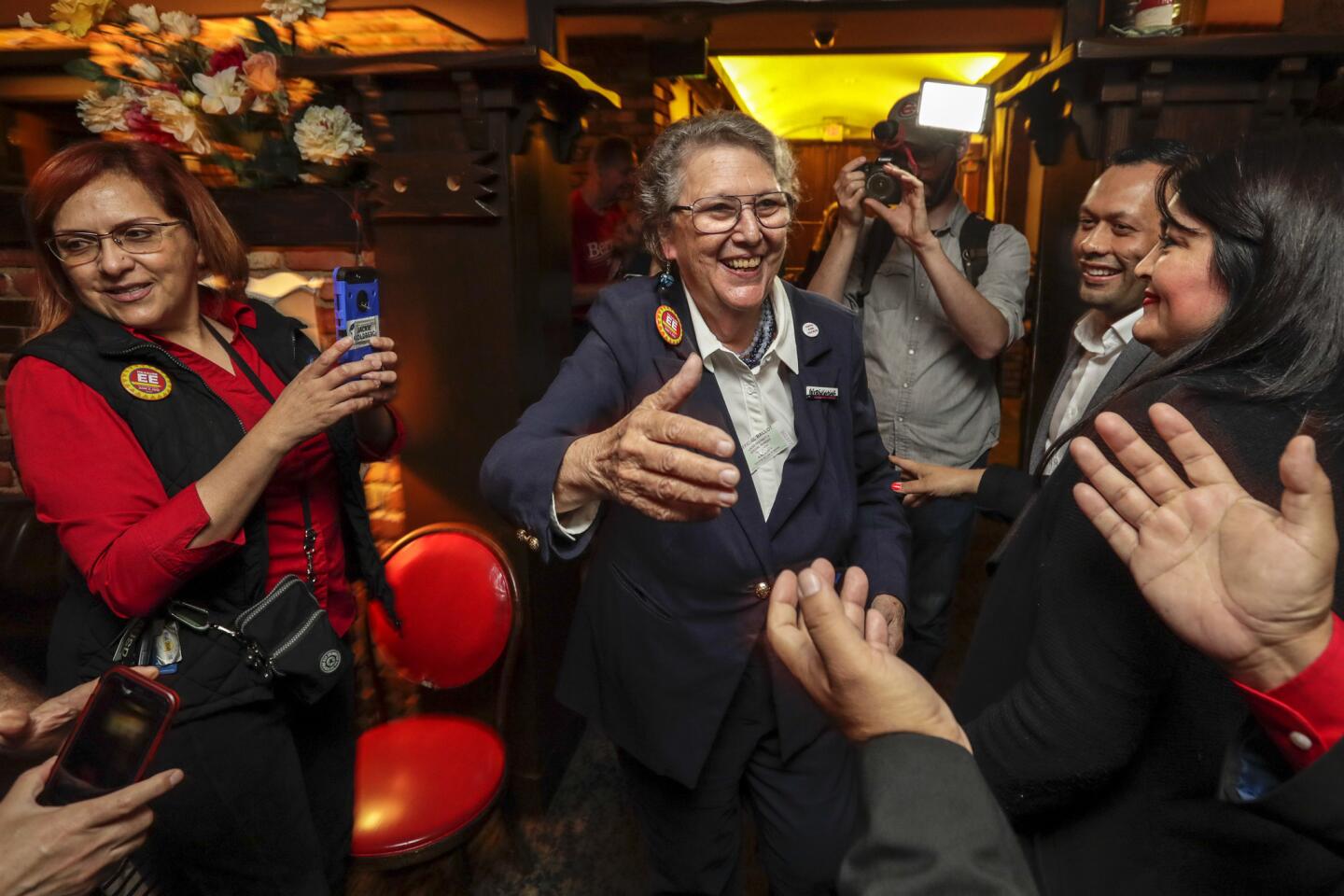 Supporters and campaign workers celebrate the apparent LAUSD school board runoff election victory for Jackie Goldberg at Taix French Restaurant.