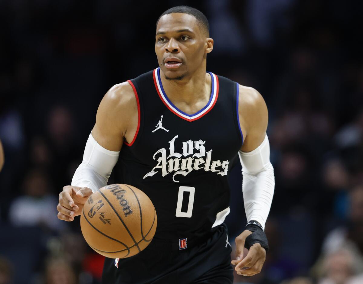Clippers guard Russell Westbrook brings the ball up court against the Charlotte Hornets