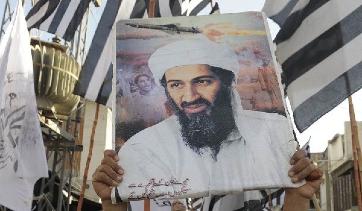 Supporters of a hardline pro-Taliban party carry an image of Osama Bin Laden on May 2, 2011, to protest his death by U.S. Special Forces in a ground operation in Pakistan's hill station of Abbottabad.