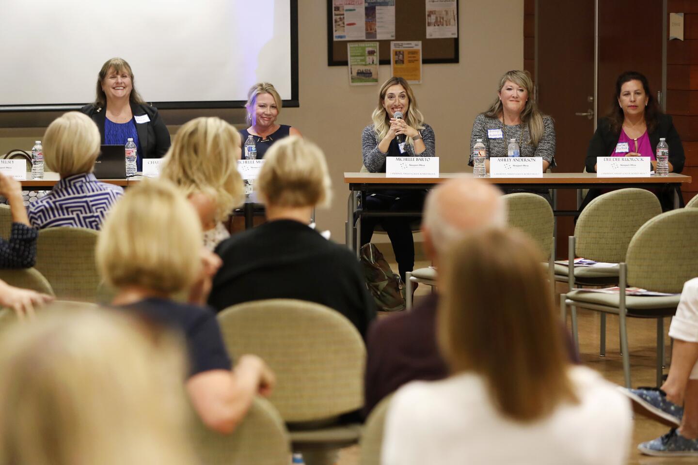 Candidates for the Newport-Mesa Unified School District board of trustees take questions during a forum Tuesday presented by the Newport Beach Women's Democratic Club at the Oasis Senior Center in Corona del Mar. Pictured from left are Charlene Metoyer, Michelle Murphy, Michelle Barto, Ashley Anderson and Diane "Dee Dee" RuoRock.