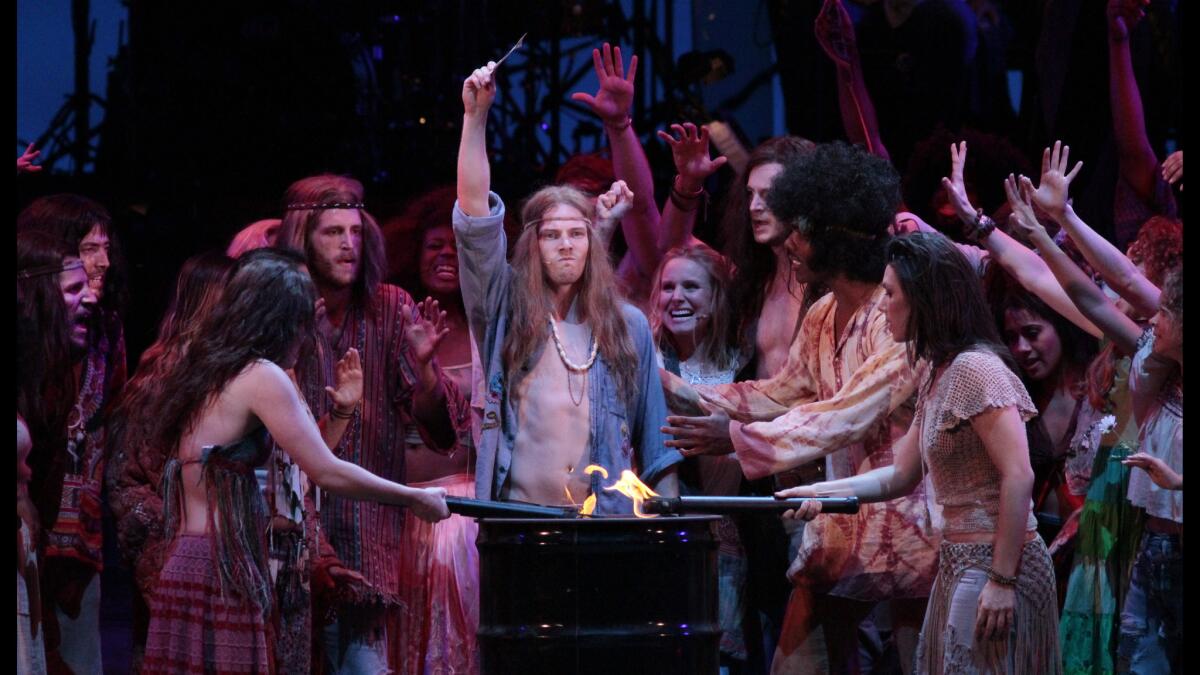 Hunter Parrish as Claude, center, and ensemble perform "Hair" at the Hollywood Bowl on Aug. 1, 2014.
