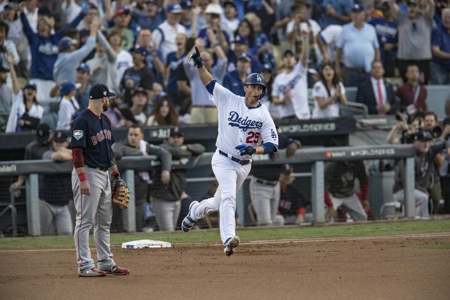 Dodgers first baseman David Freese reacts after hitting a solo homer in the first inning.