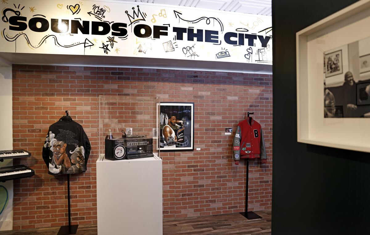 Clothing and artifacts as part of Compton Art Museum's "Sounds of the City" exhibit.