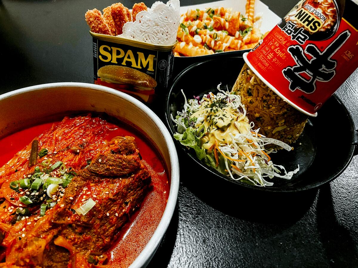 A photo of new dishes to be served at Korean bar Jail Joa, including Spam fries and fried rice made with instant noodles.