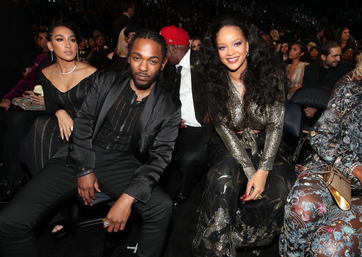 Kendrick Lamar and Rihanna, wearing vintage Cartier earrings and a ring, attend the 60th Grammy Awards at Madison Square Garden on Jan. 28 in New York.