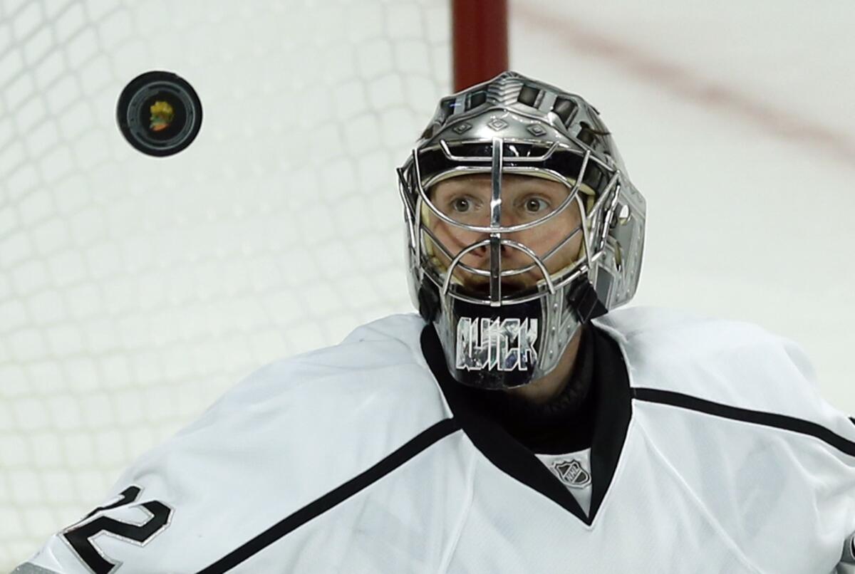 Kings goalie Jonathan Quick stays focused on the puck during the second period of Game 5 of the Western Conference finals against the Chicago Blackhawks.