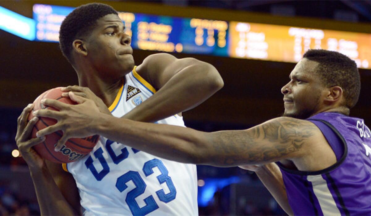 Tony Parker, shown against James Madison's Rayshawn Goins, may miss Sunday's game against Cal Poly due to back spasms.