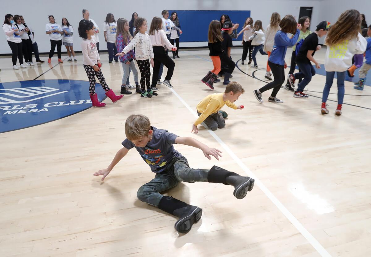 Kids play freeze dance Wednesday in an event hosted by Fresenius Kidney Care at the Boys & Girls Club of Costa Mesa. 
