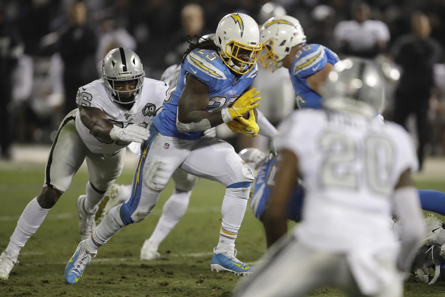 Chargers running back Melvin Gordon carries the ball against the Raiders during the first half of a game Nov. 7 at RingCentral Coliseum.