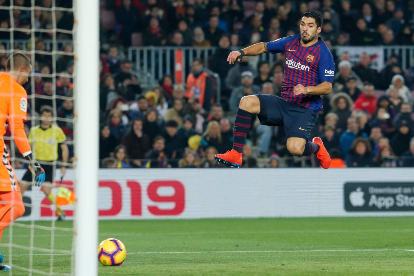 Barcelona's Uruguayan forward Luis Suarez (R) jumps for the ball in front of Real Valladolid's Spanish goalkeeper Jordi Masip during the Spanish League football match between Barcelona and Real Valladolid at the Camp Nou stadium in Barcelona on February 16, 2019. (Photo by Pau Barrena / AFP)PAU BARRENA/AFP/Getty Images ** OUTS - ELSENT, FPG, CM - OUTS * NM, PH, VA if sourced by CT, LA or MoD **