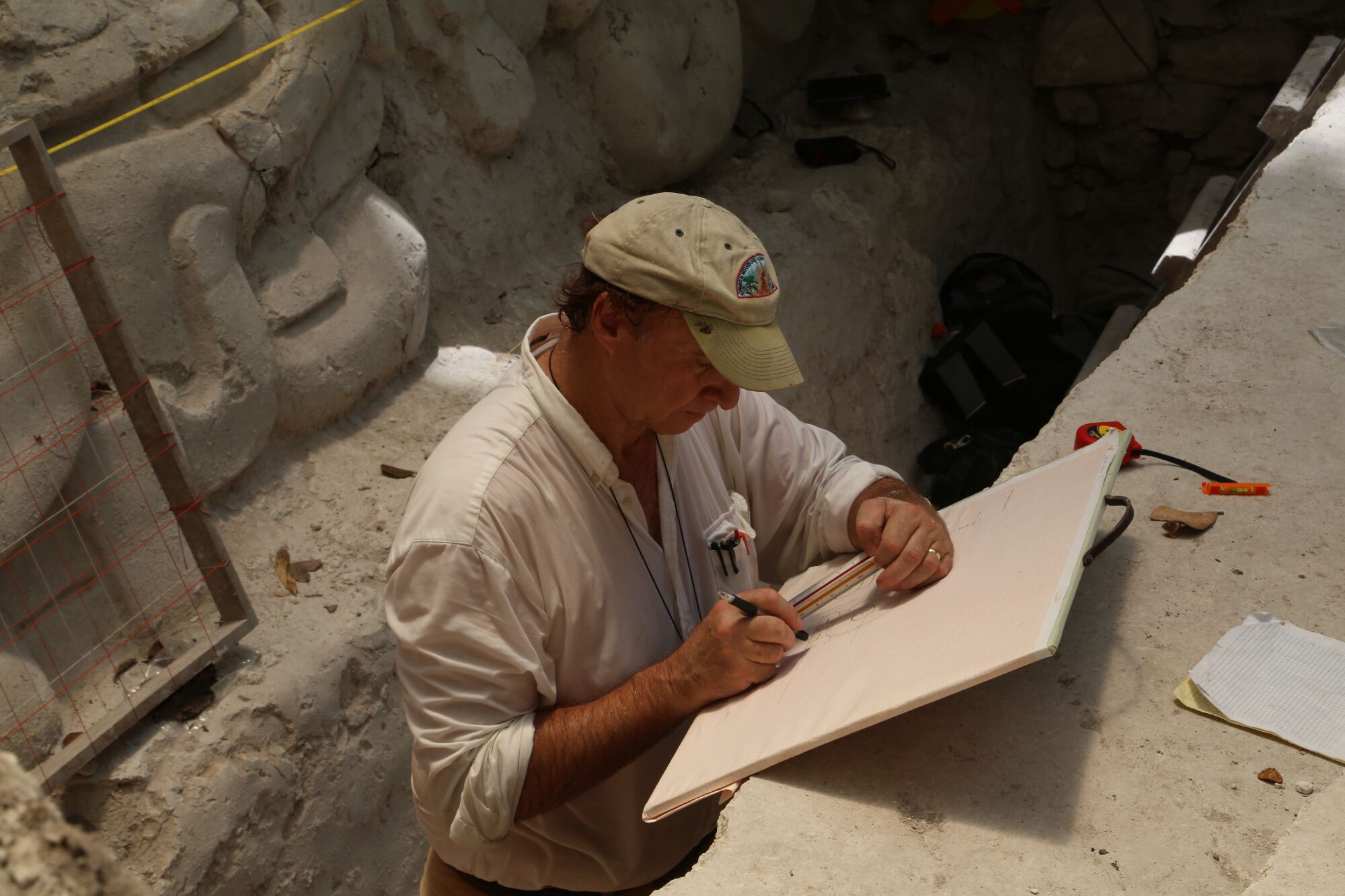 A man works at an archaeological establish 